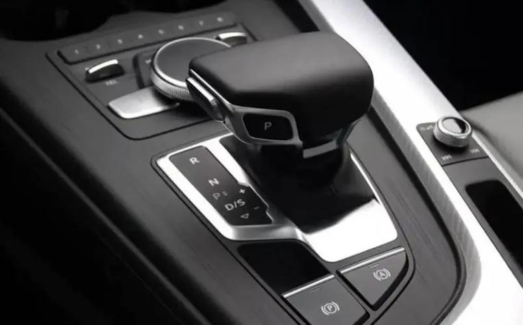 Modern_automotive_automatic_transmission_gear_shifter_lever.png